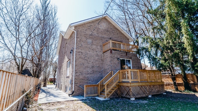 rear view of house with a balcony