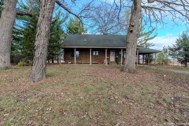 view of front of house with a carport