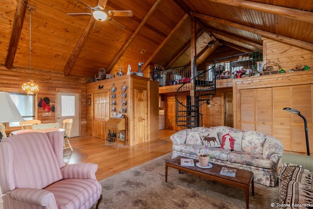 living room with wood ceiling, wood-type flooring, vaulted ceiling with beams, and wooden walls