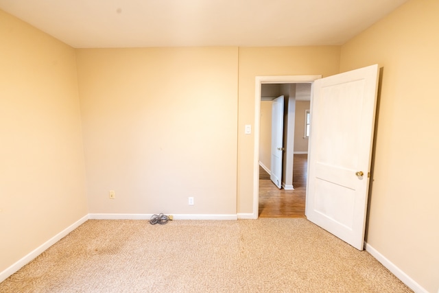 empty room featuring carpet floors