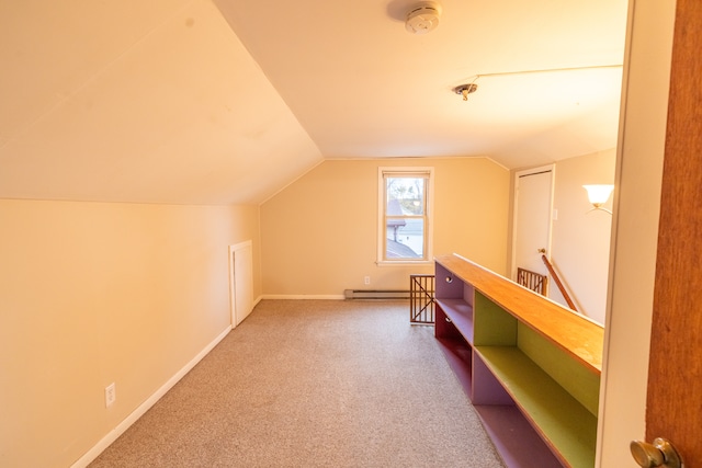 bonus room with a baseboard radiator, carpet floors, and vaulted ceiling