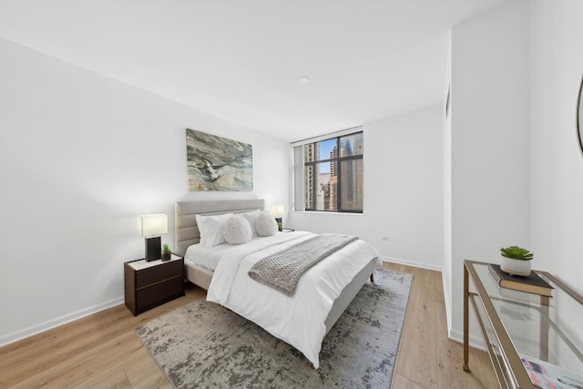 bedroom featuring light hardwood / wood-style floors