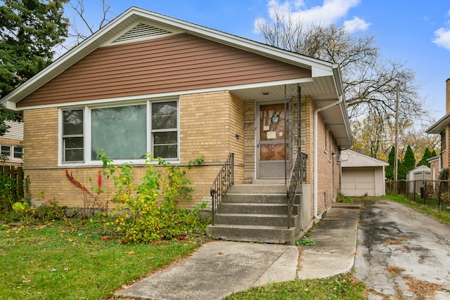 bungalow-style home with a garage