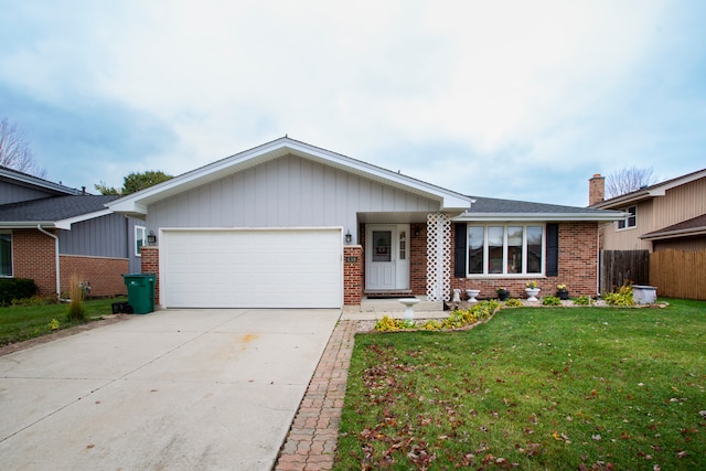 single story home with a front lawn and a garage