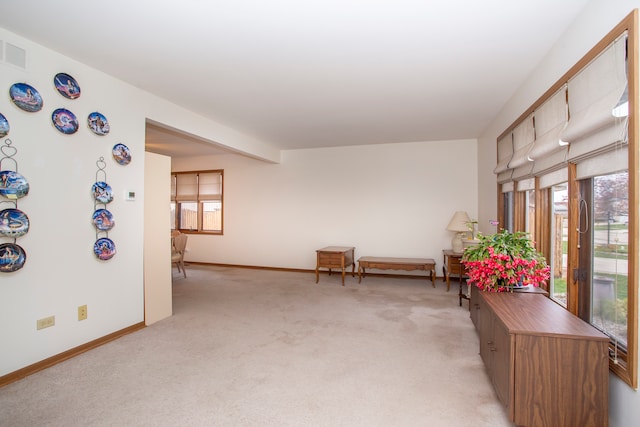 sitting room with light carpet