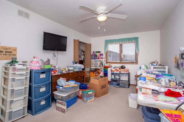 storage area with ceiling fan