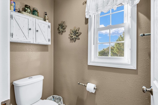 bathroom featuring toilet