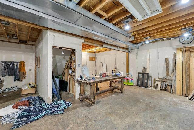 basement with a workshop area