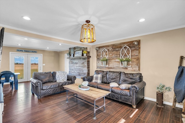 living room featuring french doors, dark wood-type flooring, and crown molding