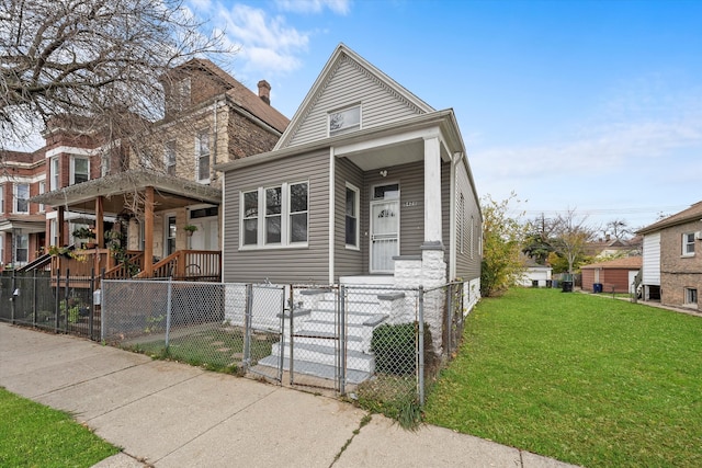 view of front of home featuring a front lawn and a porch