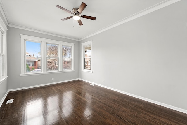 unfurnished room with ornamental molding, dark hardwood / wood-style flooring, and ceiling fan