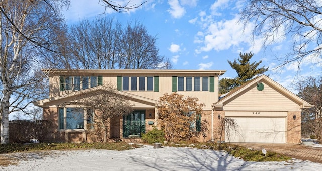 front of property with a garage