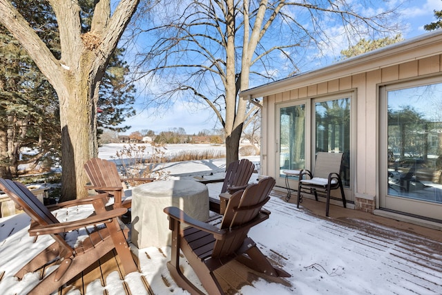 view of snow covered deck