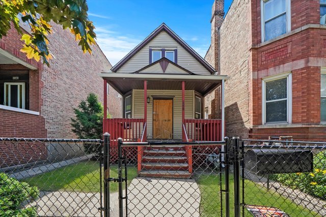 bungalow-style home with covered porch