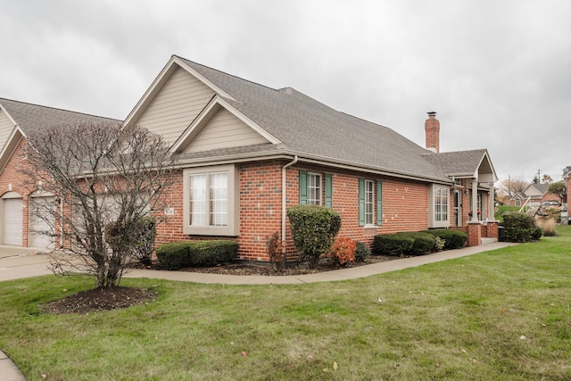 view of side of property featuring a yard