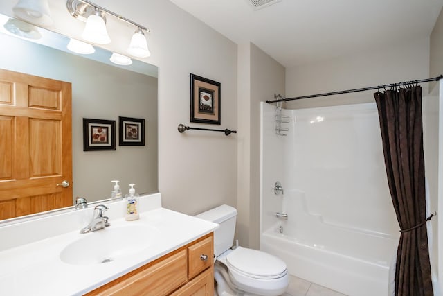 full bathroom with tile patterned floors, vanity, toilet, and shower / bath combo with shower curtain