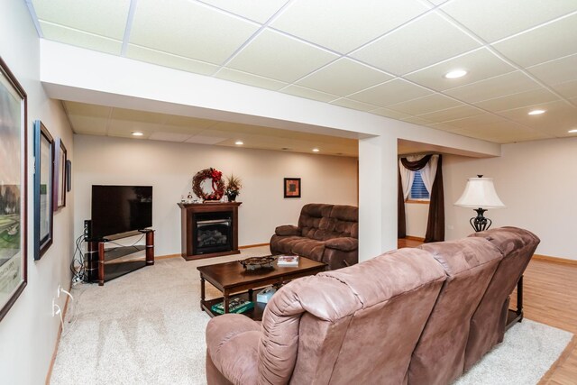 living room with light hardwood / wood-style flooring