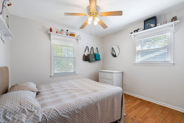 bedroom featuring ceiling fan and light wood-type flooring