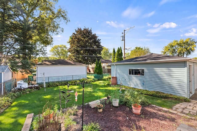 view of yard with a storage unit