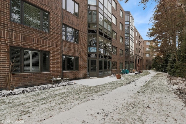 view of snow covered building