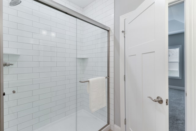 bathroom featuring walk in shower