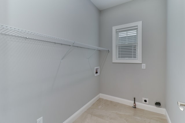 washroom with washer hookup and electric dryer hookup