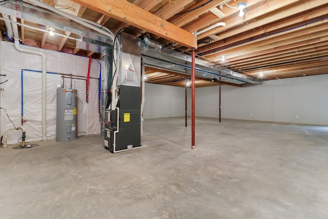 basement featuring water heater and heating unit