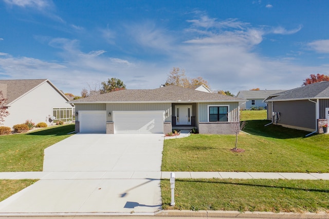 ranch-style home featuring a garage and a front yard