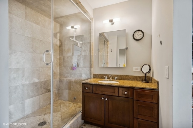 bathroom featuring vanity and walk in shower