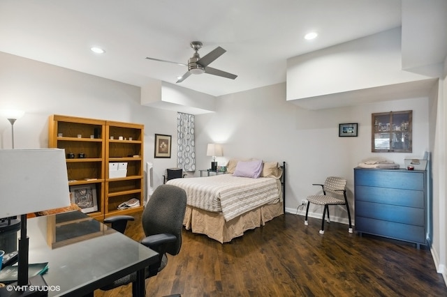 bedroom with ceiling fan and dark hardwood / wood-style flooring