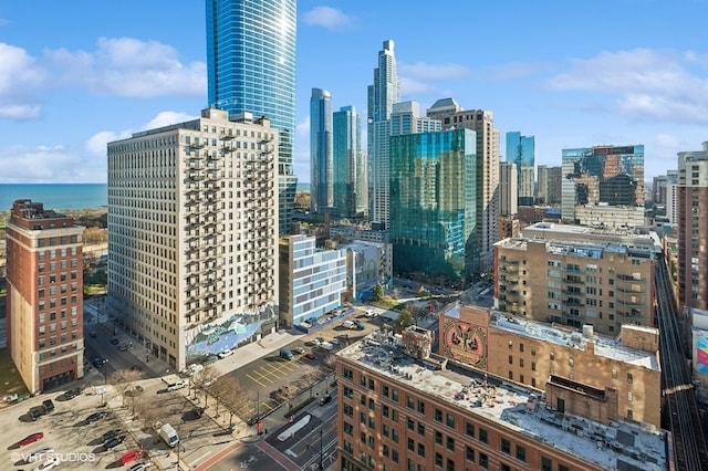 property's view of city with a water view