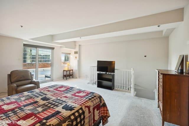 bedroom featuring light carpet and access to outside