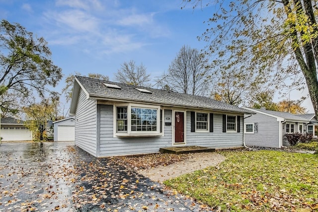 ranch-style home featuring a garage