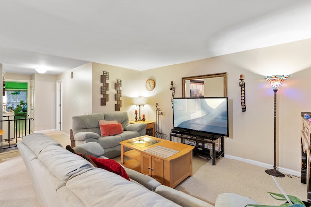 living room featuring light carpet