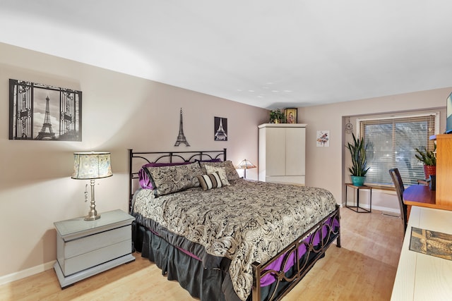 bedroom featuring light hardwood / wood-style floors