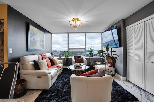 living room with a wall of windows