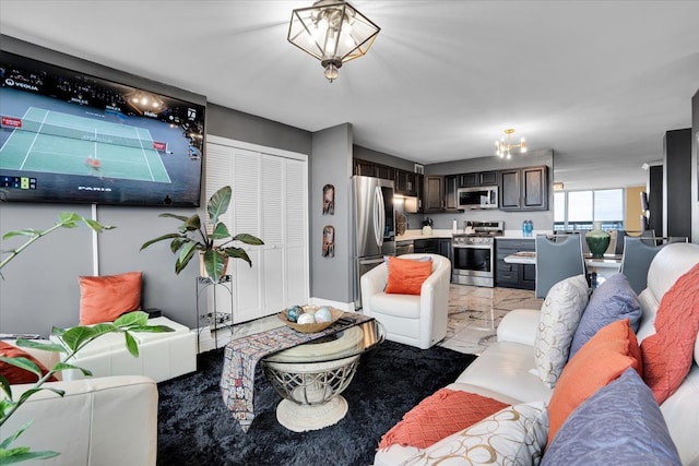 living room featuring a chandelier