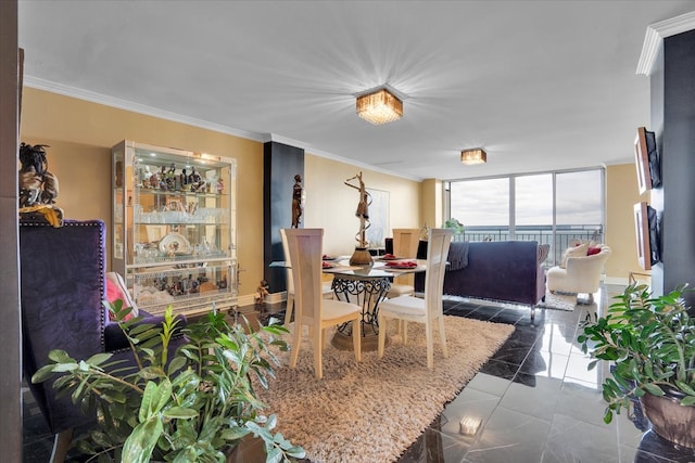 dining room with crown molding and floor to ceiling windows