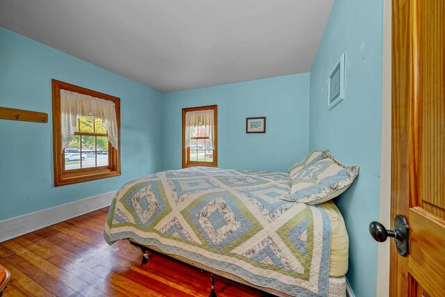 full bathroom with tile patterned flooring, shower / tub combo, vanity, and toilet