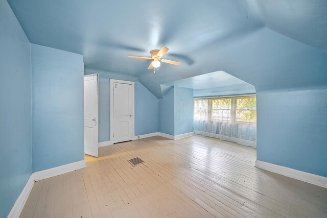 bathroom with tile patterned flooring, vanity, a paneled ceiling, and toilet