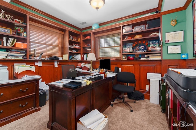 office area with light colored carpet and ornamental molding