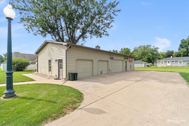 garage with a lawn