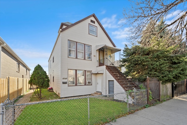 view of property with a front lawn