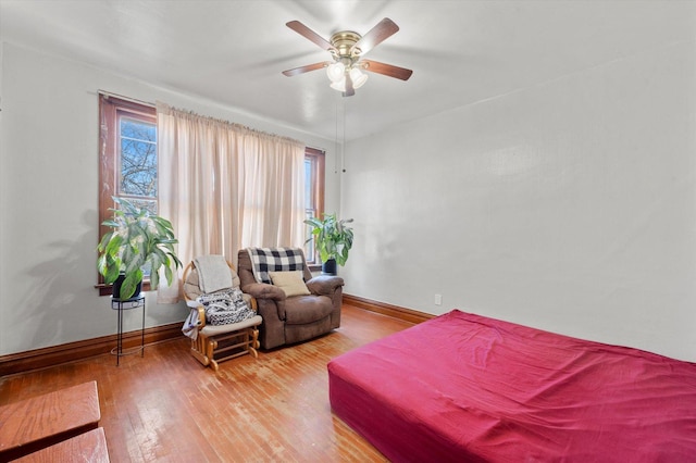 2425 W 46th Pl, Chicago, IL 60632 - bedroom featuring baseboards, wood finished floors, and ceiling fan