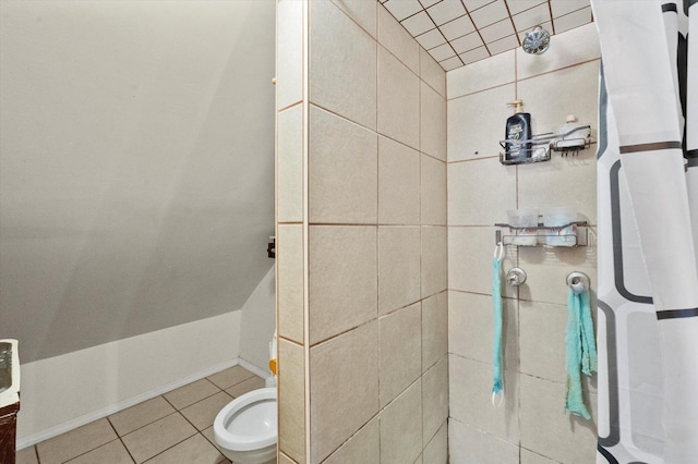 2425 W 46th Pl, Chicago, IL 60632 - full bath featuring a tile shower, tile patterned flooring, and toilet
