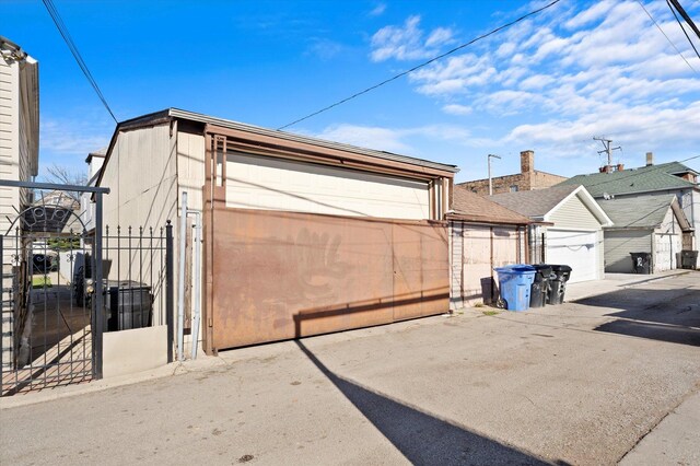 2425 W 46th Pl, Chicago, IL 60632 - detached garage with a gate and fence
