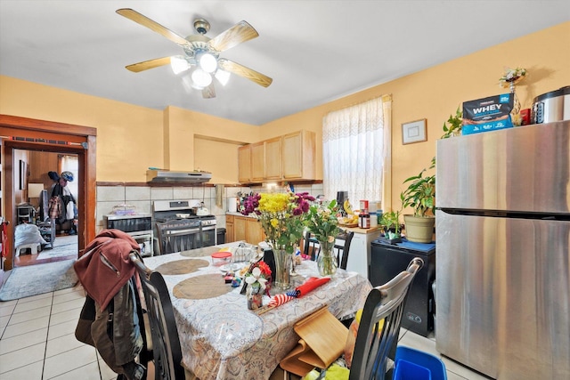 2425 W 46th Pl, Chicago, IL 60632 - dining space featuring light tile patterned floors and ceiling fan