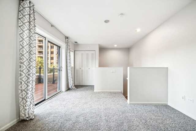 unfurnished room with carpet floors