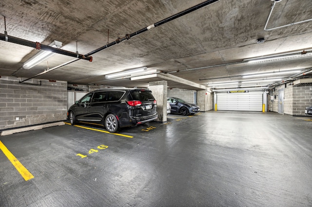 garage featuring a carport