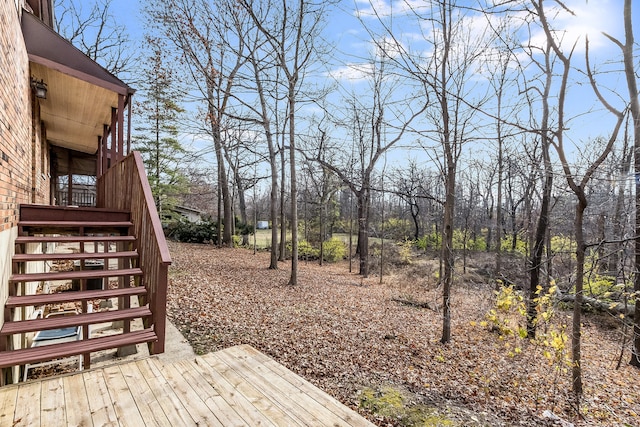 view of yard featuring a wooden deck